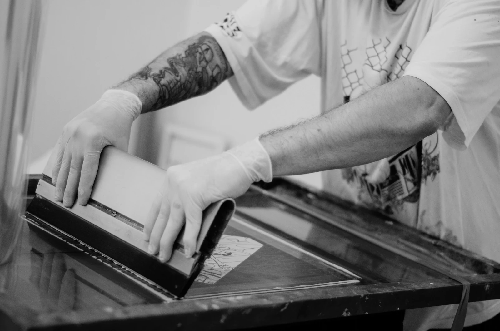 a man in a white shirt and white gloves. Photograph accompanying Velaharra’s creative approval process guide.